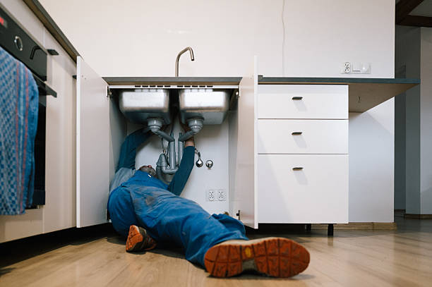 Professional Emergency Plumber technician working in Waukee, IA